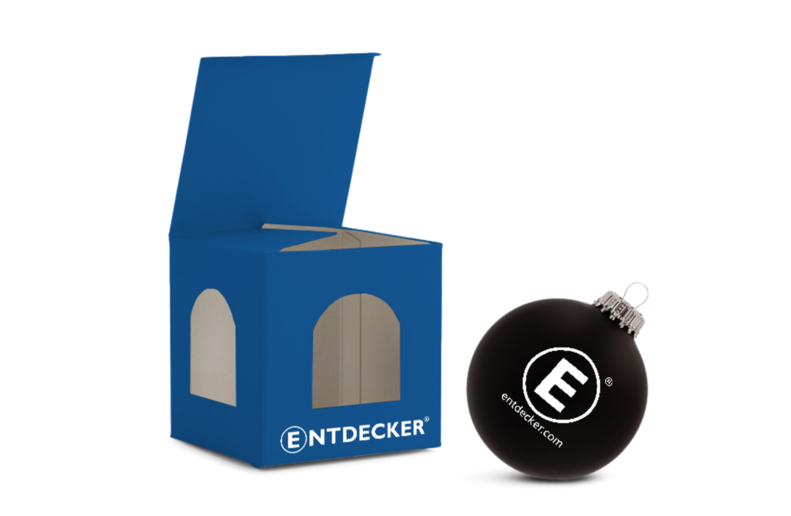 Leere blau bedruckte Weihnachtskugelbox mit daneben liegender schwarzer Weihnachtskugel mit individuellem Druck.