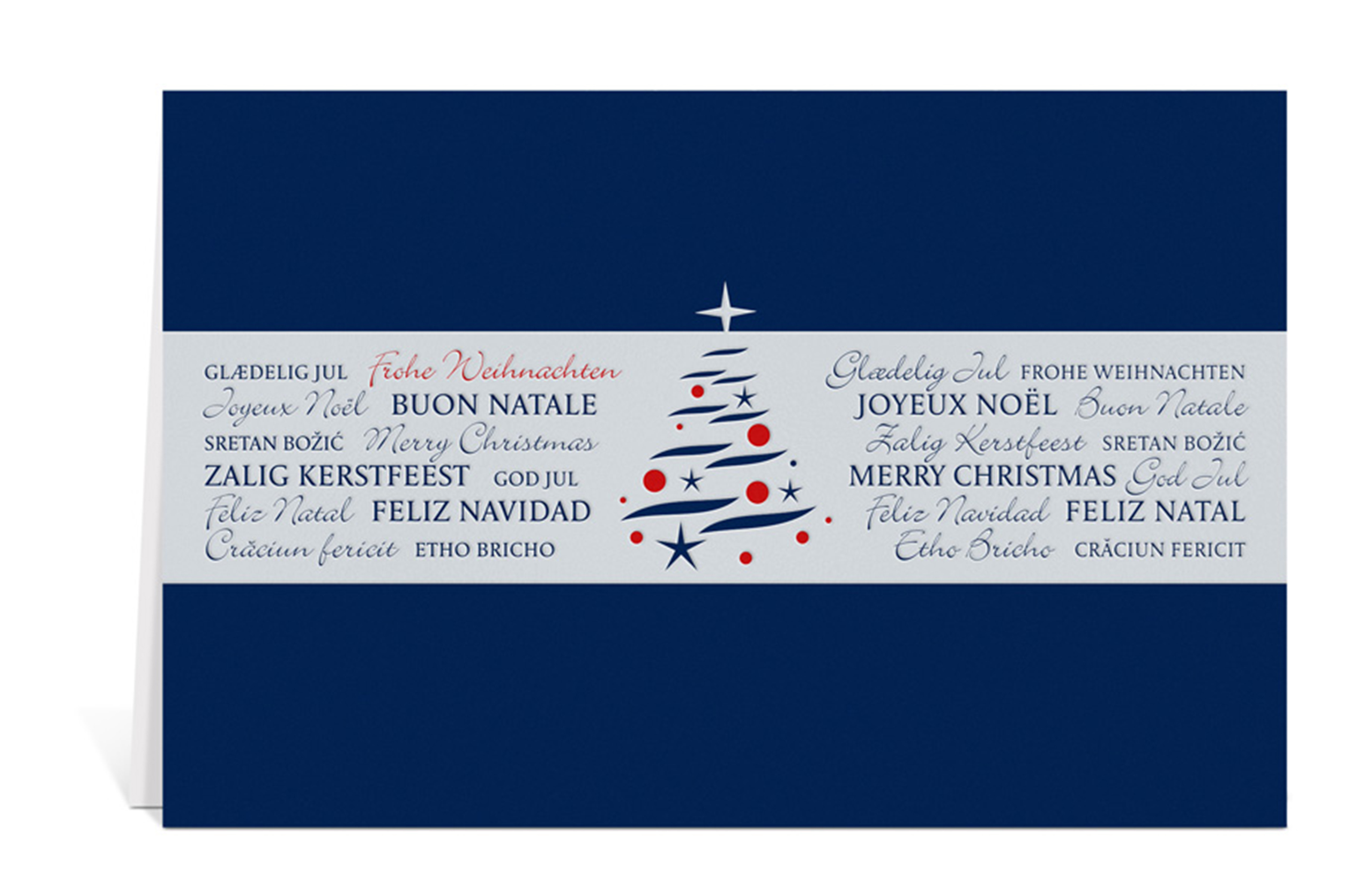 Dunkelblaue Weihnachtskarte mit einem weißen Streifen, in dem Frohe Weihnachten auf verschiedenen Sprachen steht und in der Mitte der Karte ist ein Weihnachtsbaum zu sehen