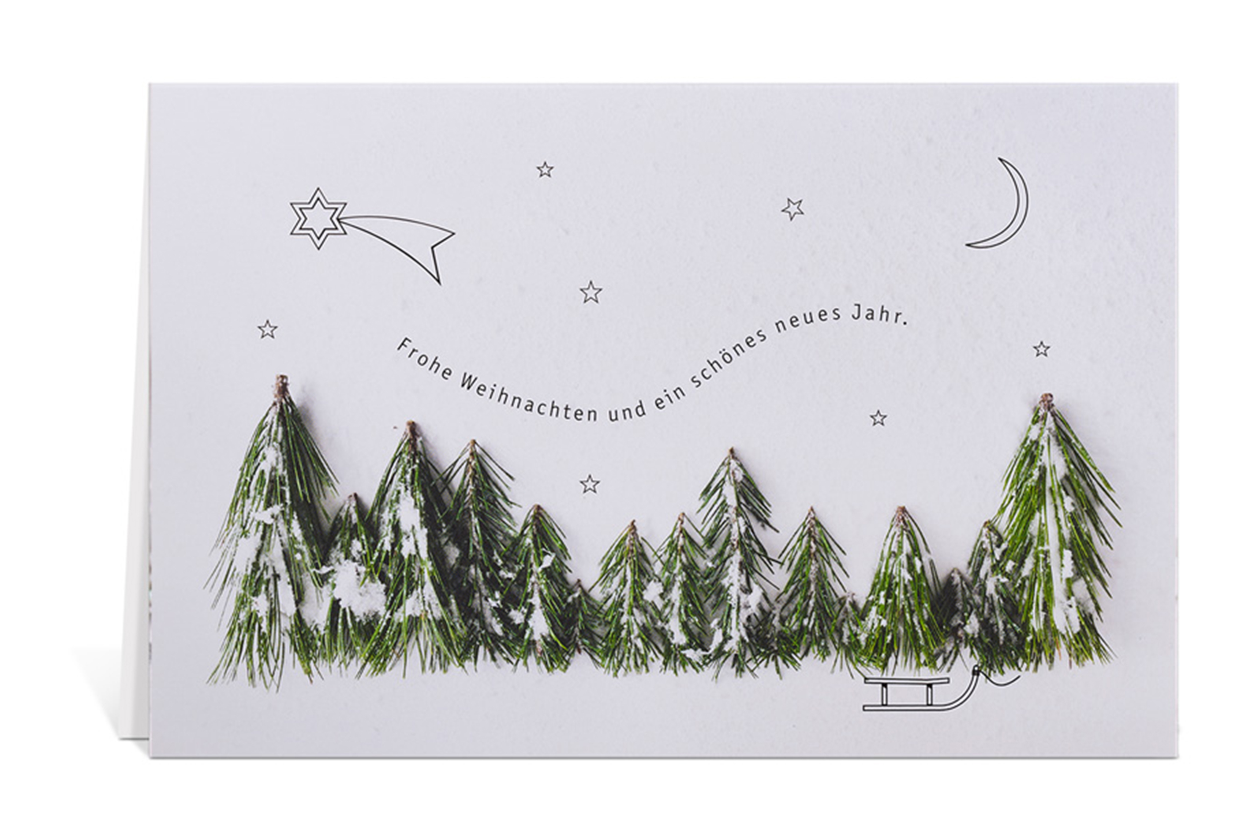 Weihnachtskarte mit Tannenspitzen und Schnee als Weihnachtsbäumen, sowie einem kleinen Schlitten, Mond und Sternen. Dazu der Text: Frohe Weihnachten und ein schönes neues Jahr